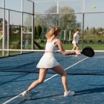 full-shot-friends-playing-paddle-tennis-outdoors